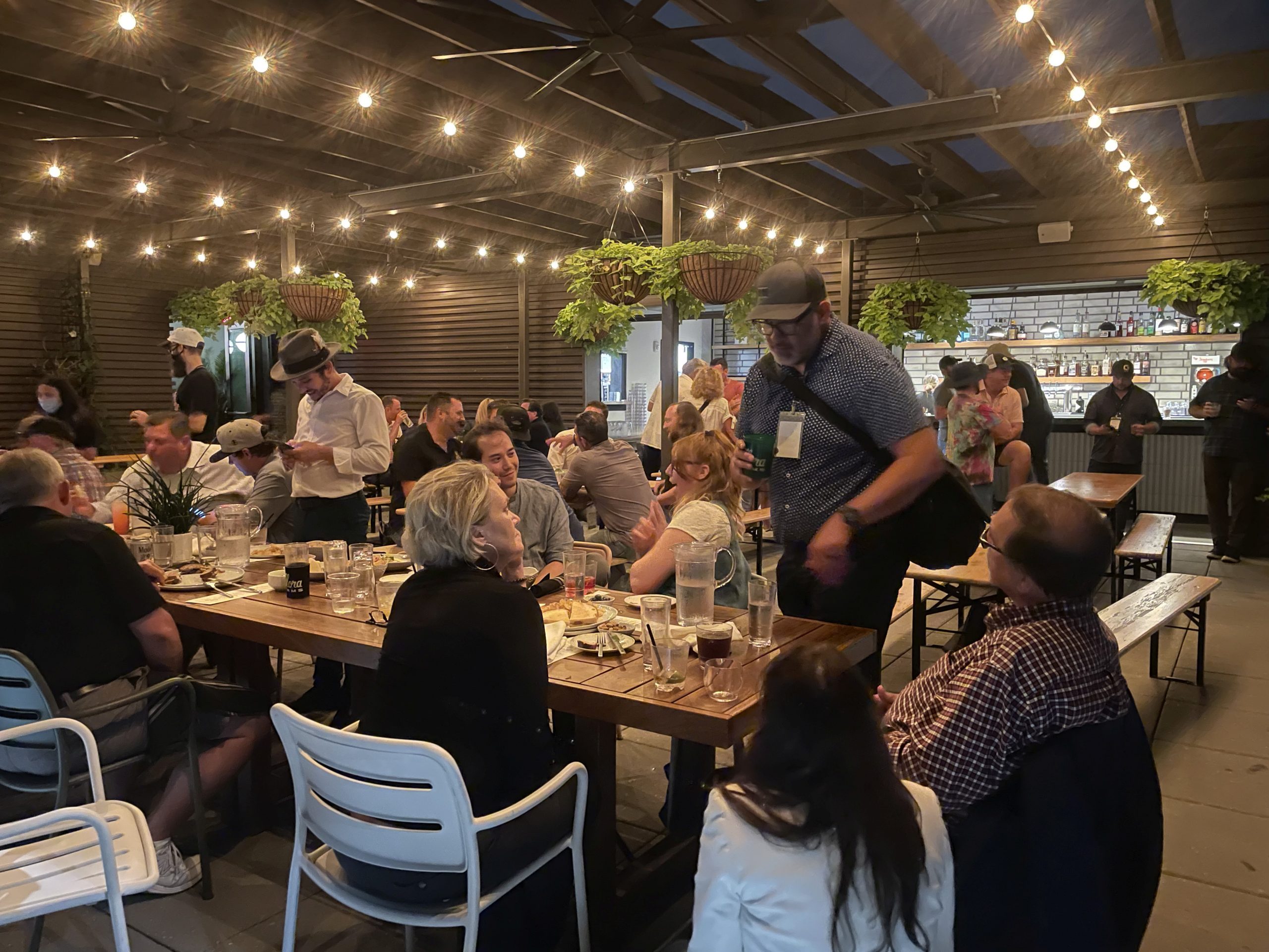 Members of the medical marijuana industry of Missouri share a meal and community at Percheron Rooftop Bar, hosted by Flora Farms